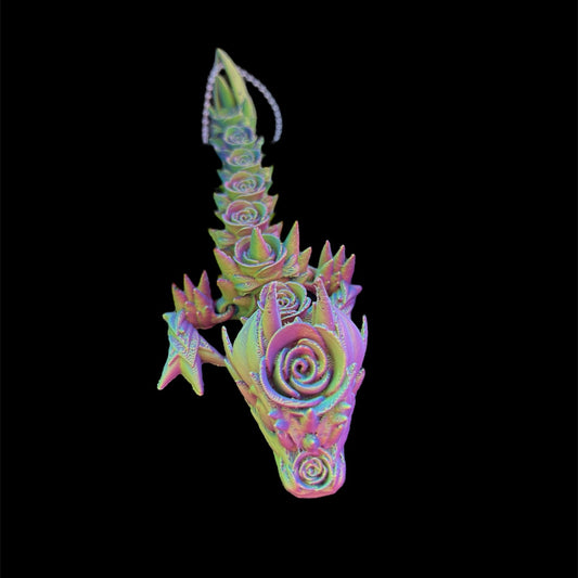 A multicolored 3D printed sculpture of a fantastical dragon with a rose-like pattern on its body.